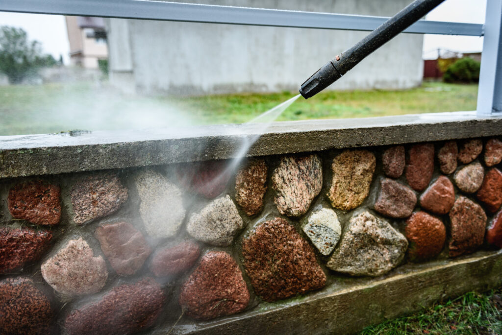 Power washing retaining wall