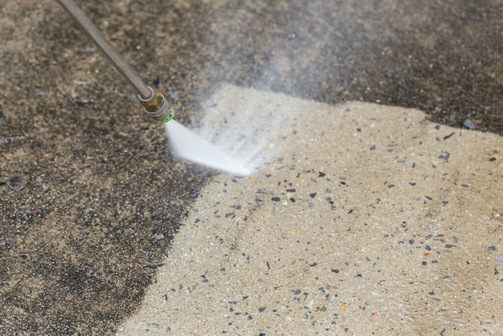 Power washing sidewalk